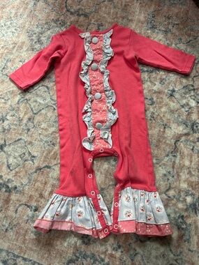 Ricrac & Ruffles Coral Ruffle-Front Baby Snap Romper with Flare Bottoms